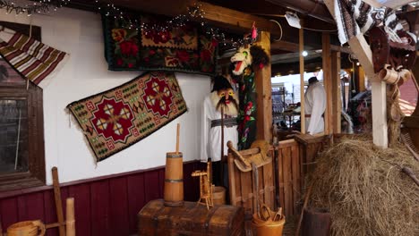 souvenir stall with traditional romanian handicrafts and costumes