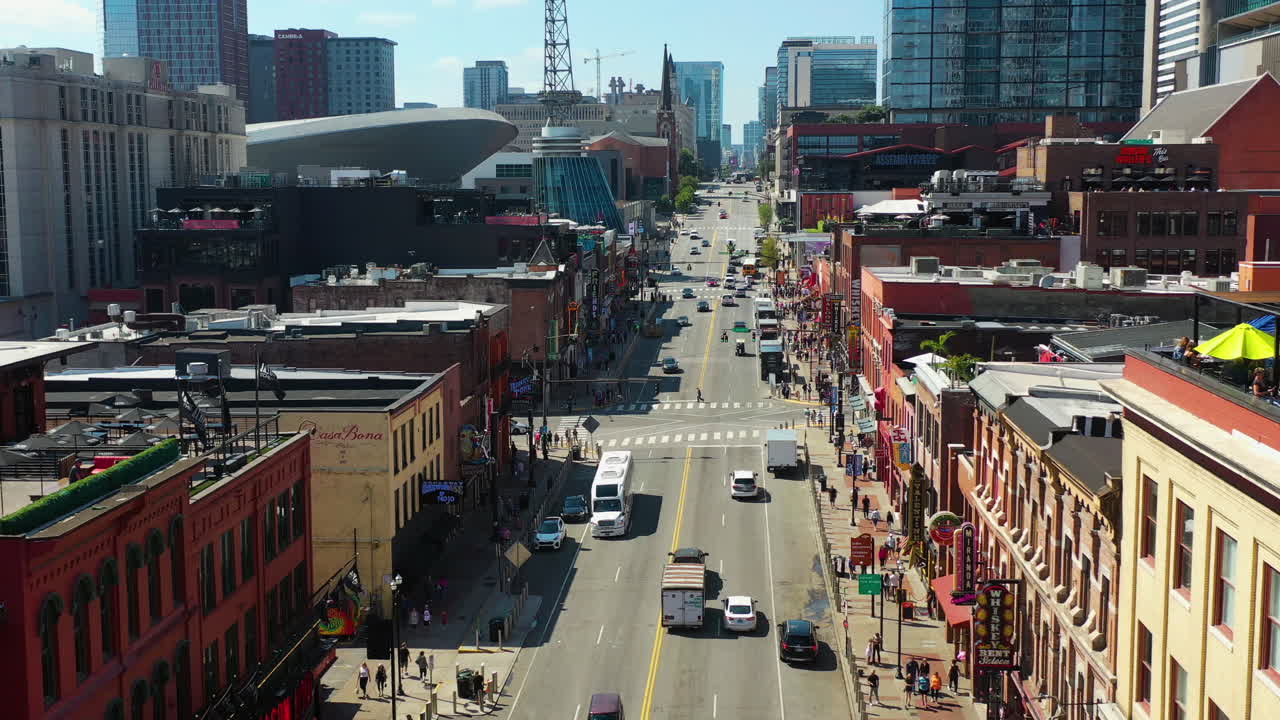 Drone flying along the Broadway street, sunny day in Nashville, Tennessee, USA