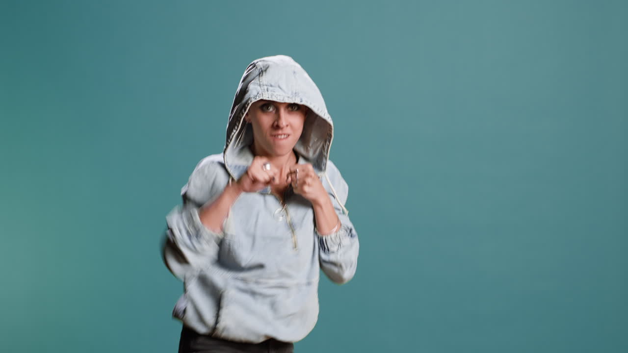 Woman in Hoodie Posing