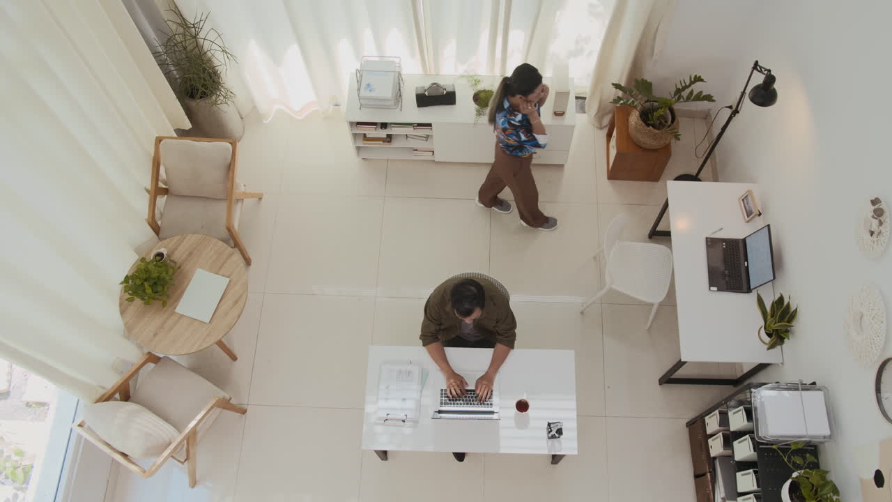 Businesspeople Coworking in Modern Office Top Down