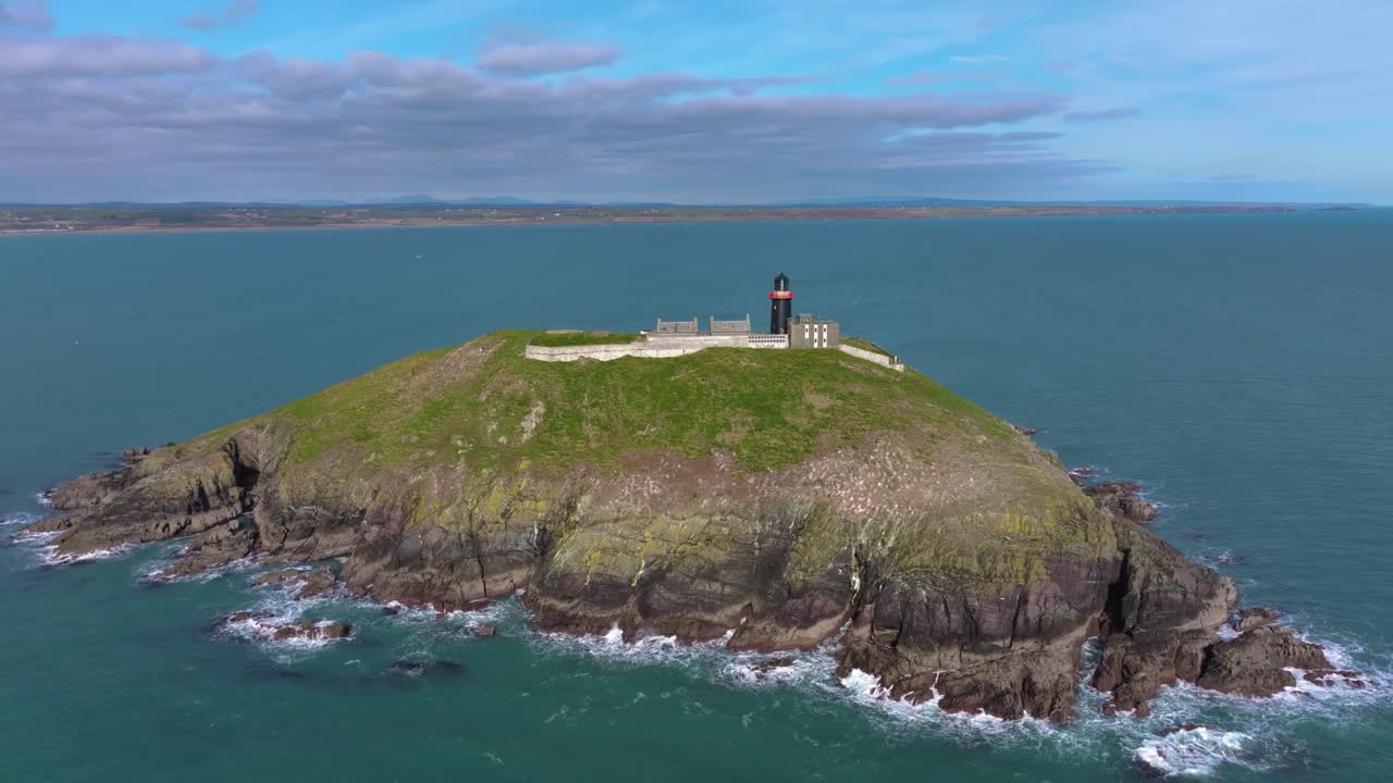 4K Cinematic Drone shot of the black Ballycotton Lighthouse overlooking the Atlantic Ocean, a symbol of Ireland’s maritime heritage Co.Cork - Ireland_19