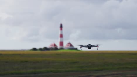 drone flying towards lighthouse destination quickly. moving further