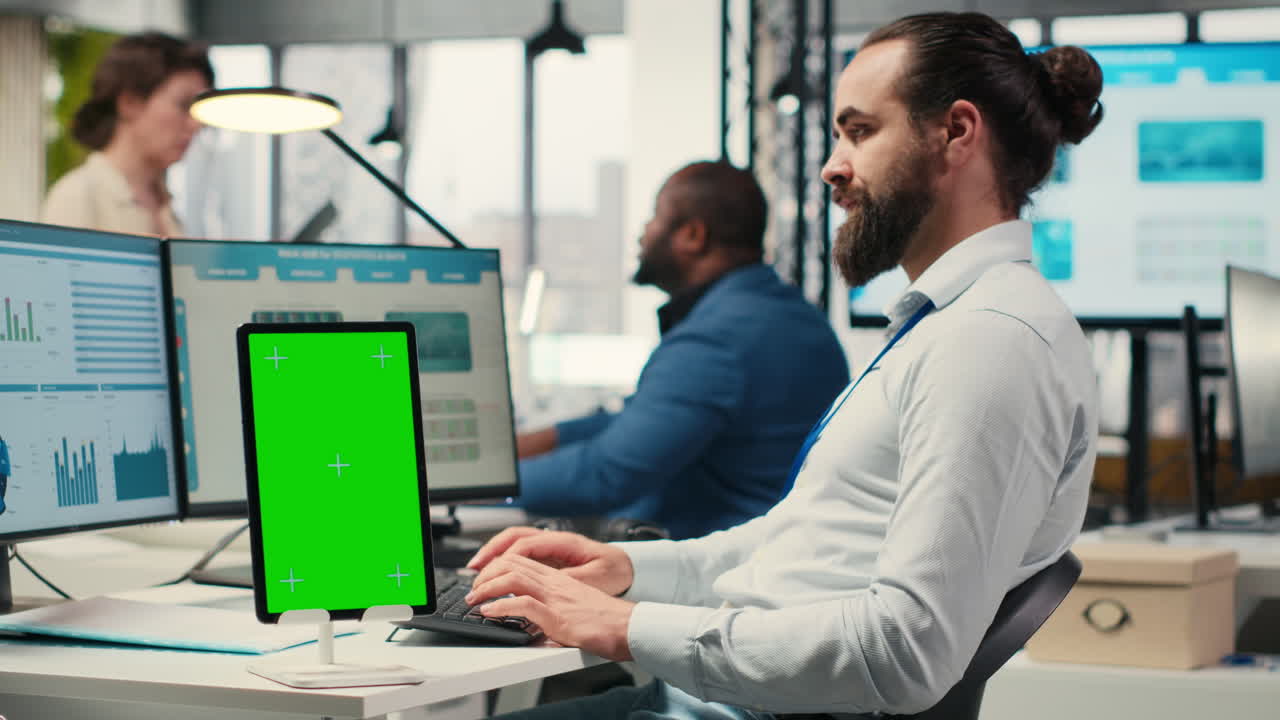 Vertical Video Male executive manager works with graphs and isolated mockup screen