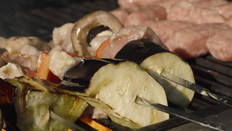 Close-Up-of-Flame-Grilled-Shish-Vegetable-Kebabs-on-Summer-Evening-BBQ