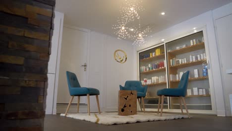 slow revealing shot of a spa waiting room with products on the shelves