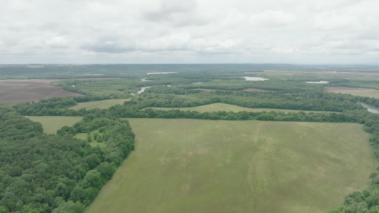 Ethereal, dream-like scenery of asleep nature, seen from the bird's-eye view