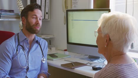 doctor examining a senior woman in a retirement home