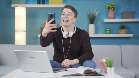 student making a video call on the phone.