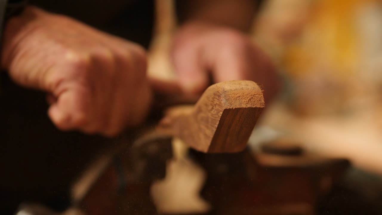 Sanding Teak Wood Trim for Boat Building Close Up