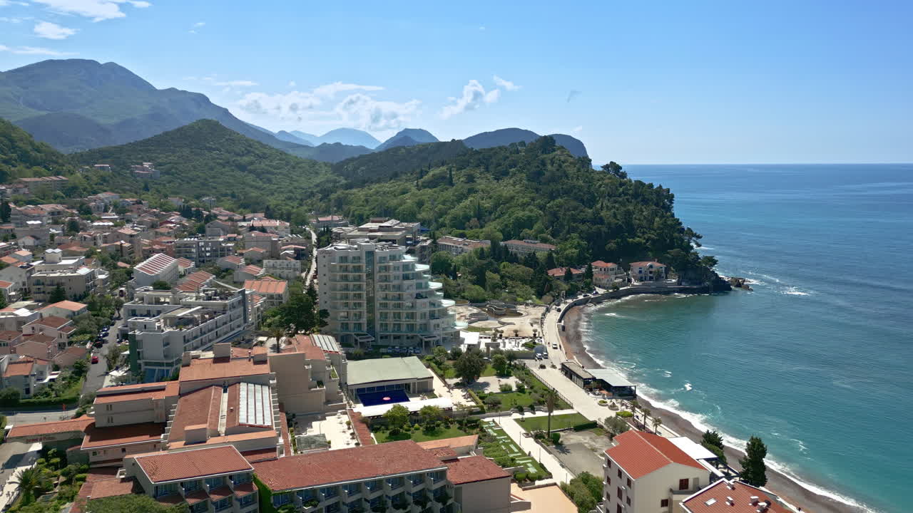 Coastal Town with Mountain Views