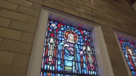 Close-Up-of-Sunlight-Illuminating-a-Beautiful-Stained-Glass-Window