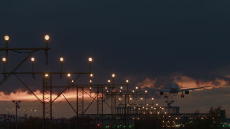 airplane landing at night in stormy weather