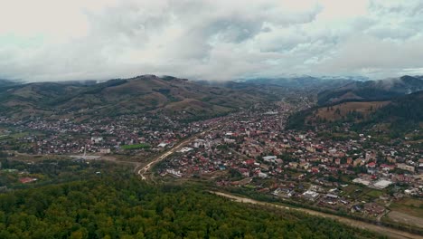 hyperlapse of gura humorului city with fast-moving clouds