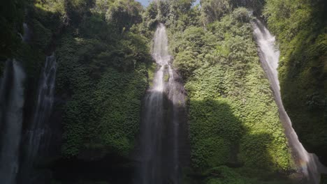 stunning multiple waterfalls in a lush tropical jungle landscape