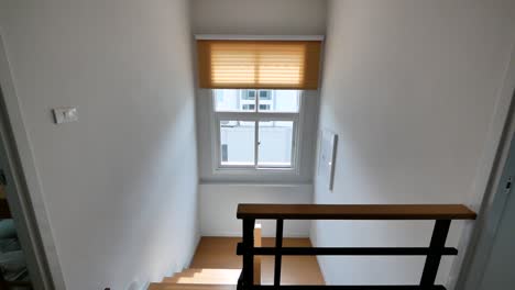 wooden staircases from top view with natural light