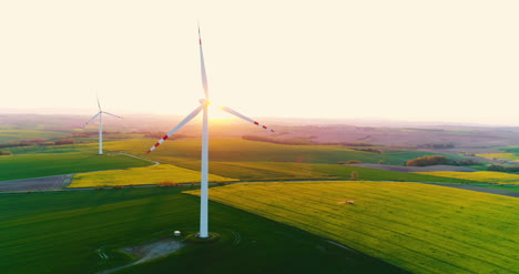 Aerial-View-Of-Windmills-Farm-Power-Energy-Production-3