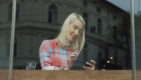 attractive woman sitting in a cafe