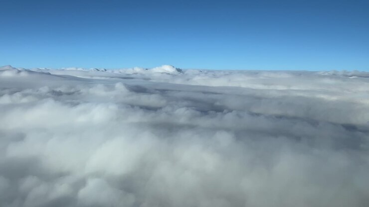 POV flying over a sea of clouds as seen by the pilot