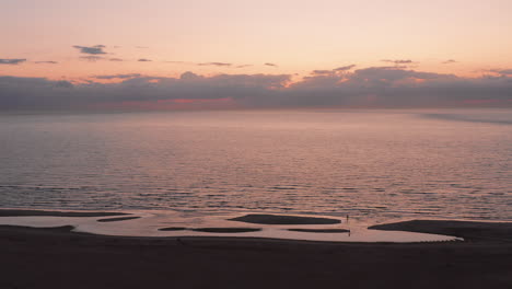 The-beach-of-the-island-Neeltje-Jans,-the-Netherlands-during-sunset-in-summer