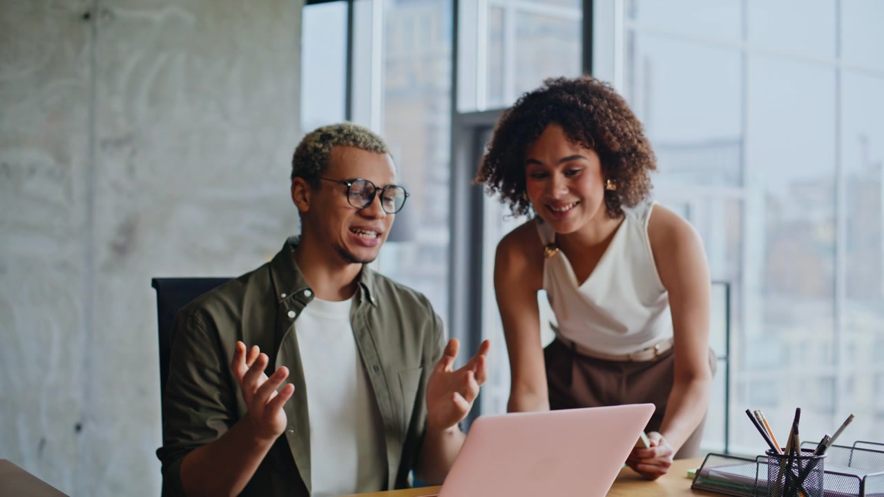 African american coworkers brainstorming ideas laptop startup office meeting