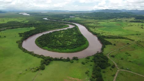 aerial drone shoot view winding river, tropical rainforest, natural wilderness