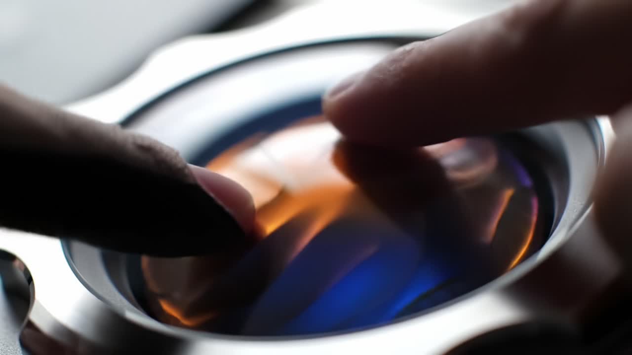 Fingers Interacting with a Smooth, Colorful Surface: An Artistic Representation of Touch and Texture in the Modern Digital World