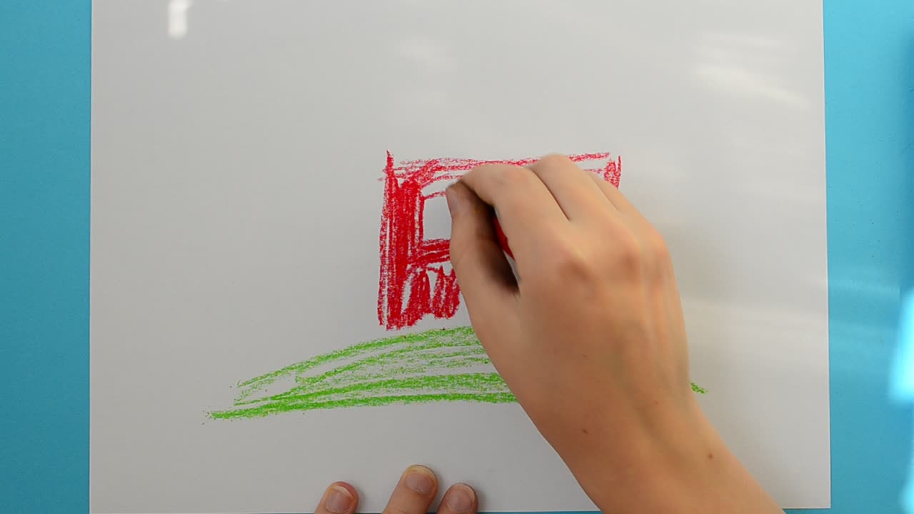 Draw house. The child draws the picture