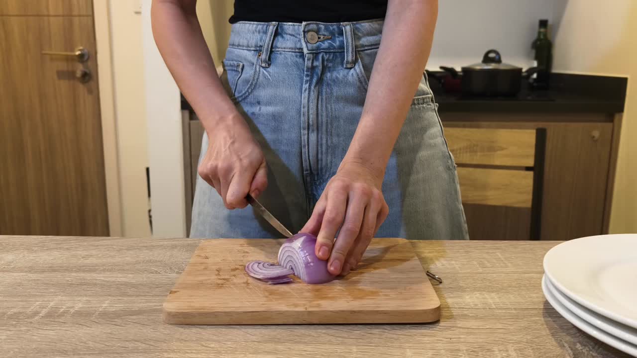 Cutting Red Onion in the Kitchen