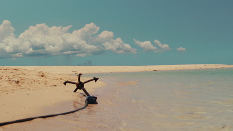 anchor on tropical beach