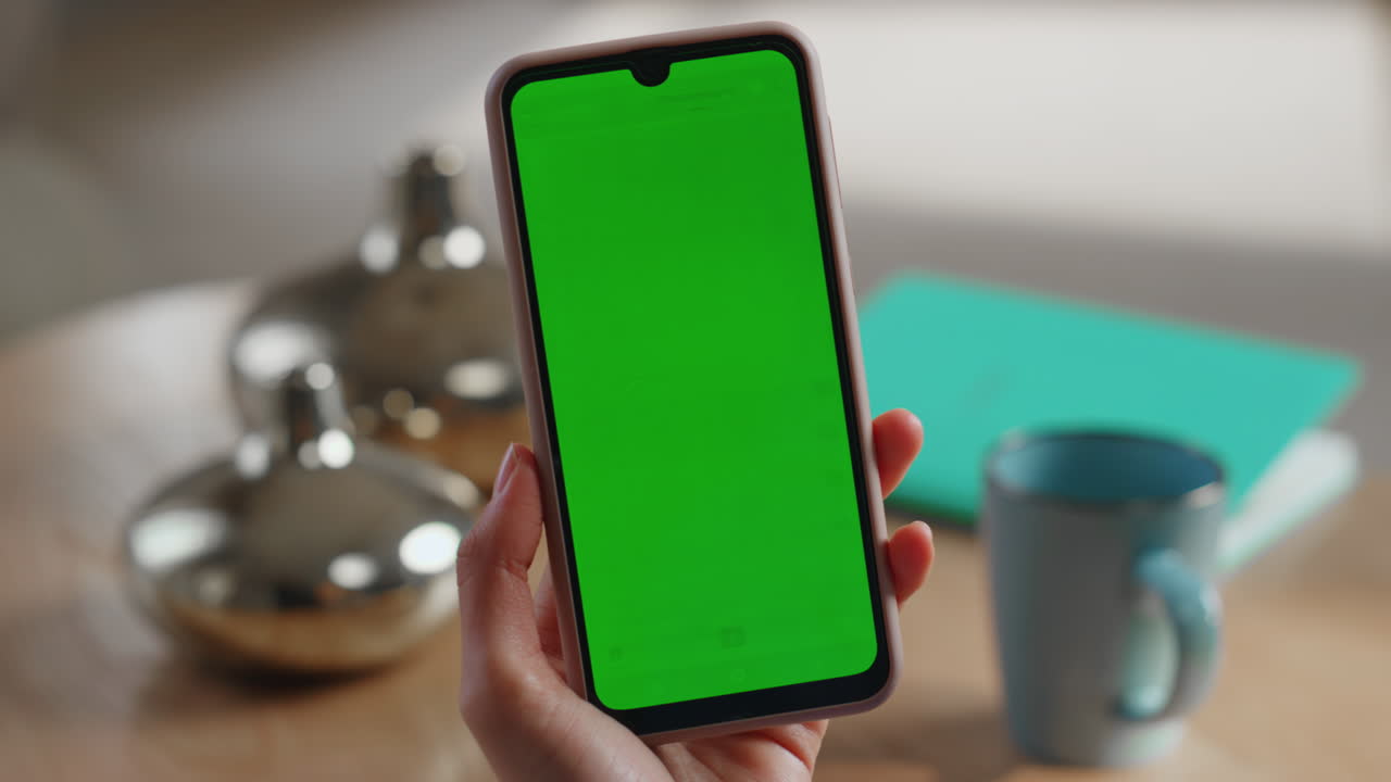 Smartphone con pantalla verde