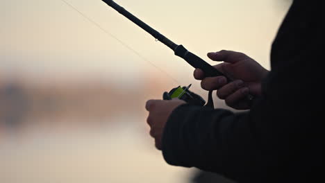 fisherman with fishing rod