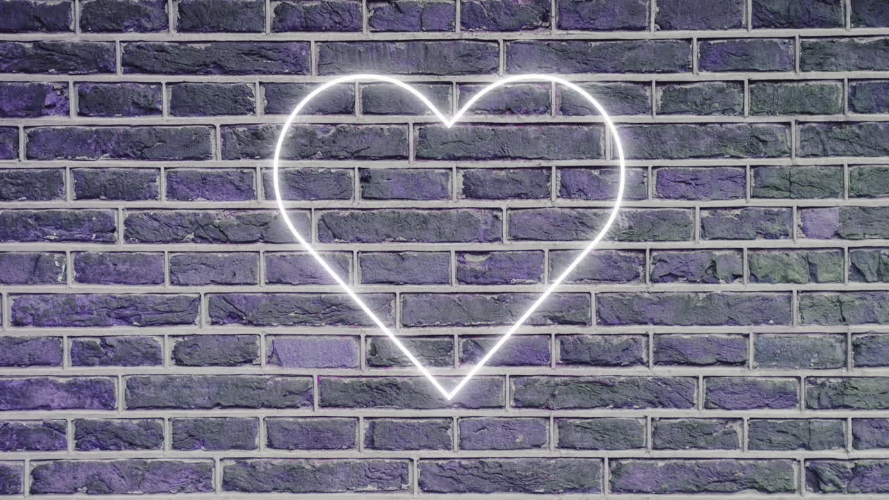 벽돌 벽 4k에 네온 표지판을 내려 놓습니다.