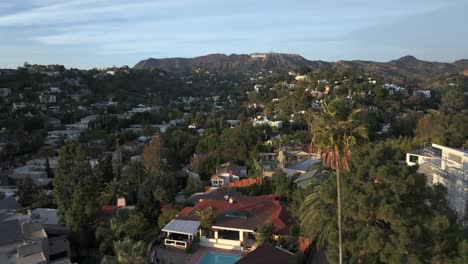 hollywood hills, los angeles, residential neighborhood and landscape under famous sign, aerial view