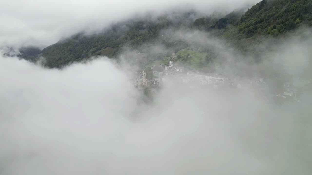 Misty Mountain Village: A Serene Aerial View