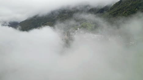 misty mountain village: a serene aerial view