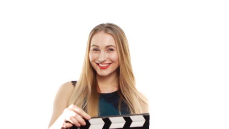 woman holding clapperboard