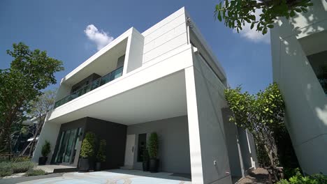 white minimal and modern home exterior design, no people, tilt down-4