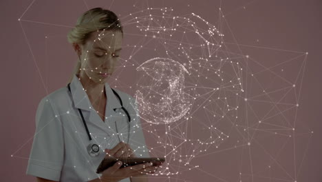 using tablet, healthcare professional viewing digital network animation in hospital