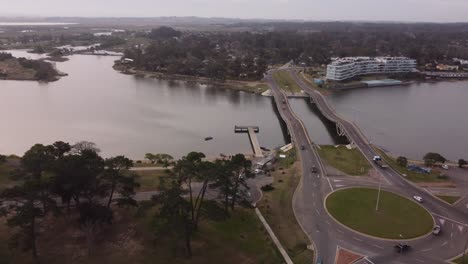 Incredible-shape-of-Leonel-Viera-unusual-wavy-bridge-and-roundabout-over-river-Arroyo-Maldonado-in-Uruguay