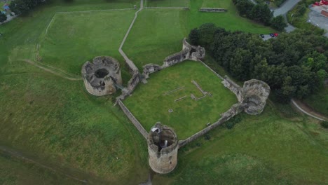 flint castle welsh medieval coastal military fortress ruin aerial birdseye descent view