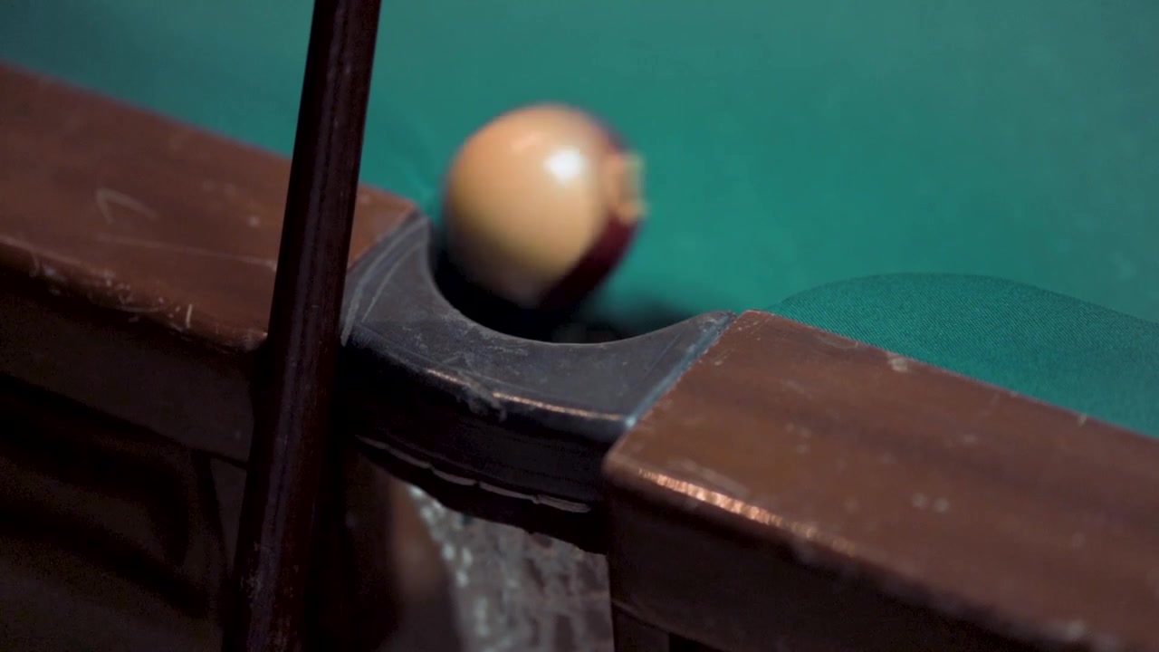 Pool billiard brown fourteen ball into the pocket