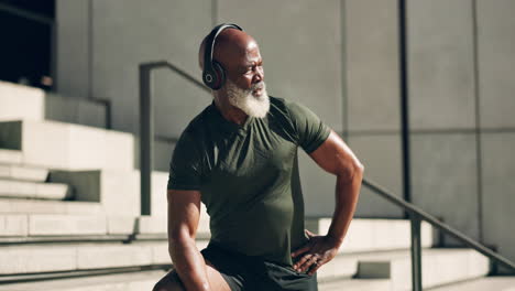 Mature-man,-smart-watch-and-exercise-in-city