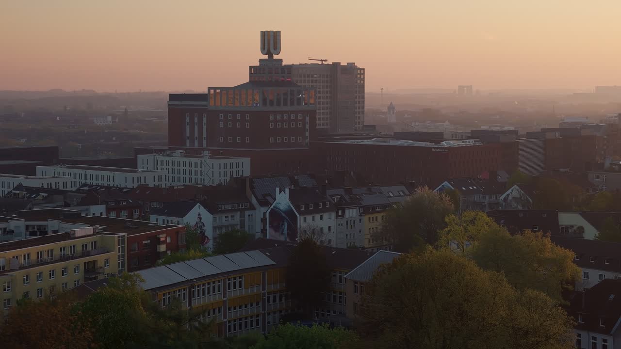 Aerial of U Tower building and cityscape, twilight. Cultural and art community centre. Dortmund
