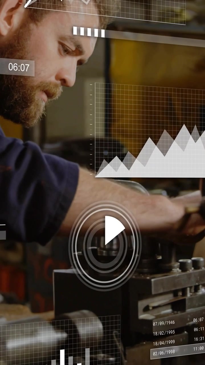 Vertical video: Machining tech turning knob adjusting clamp, graphs tracking progress for precision