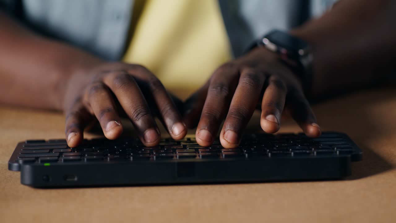 Person Typing on a Keyboard