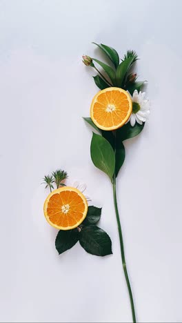 orange slices and flowers arrangement
