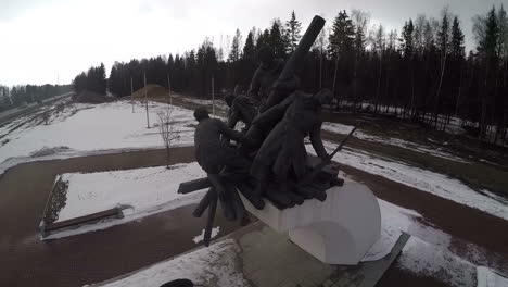 flying over the war memorial by the road