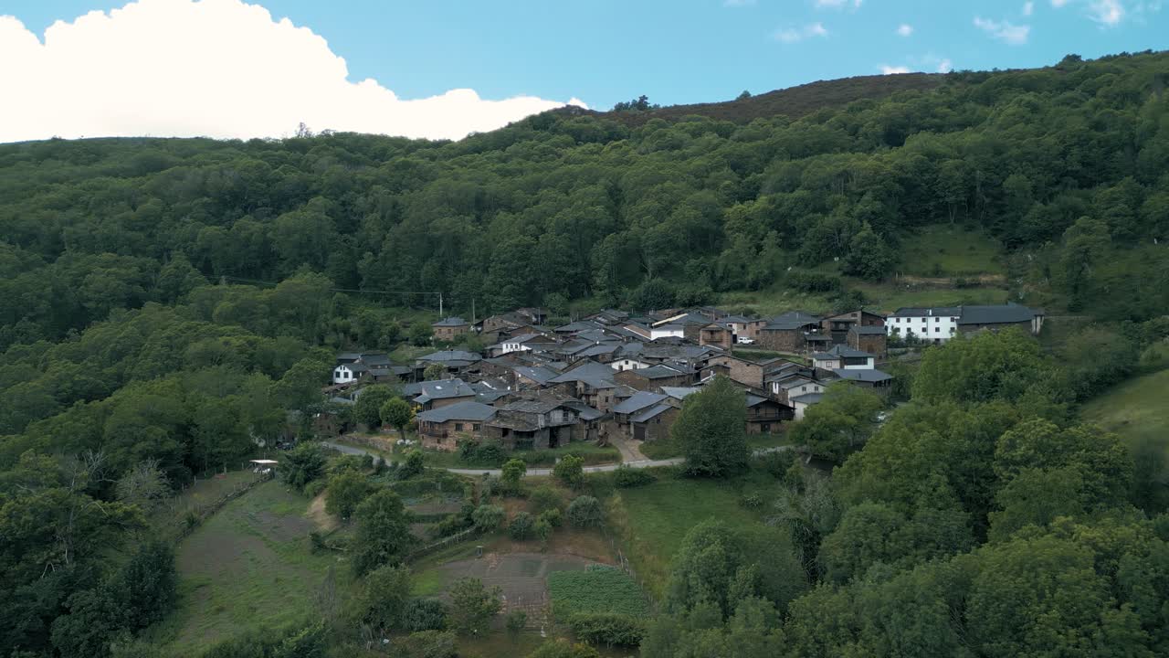 Aerial View of a Picturesque Village Nestled in the Mountains