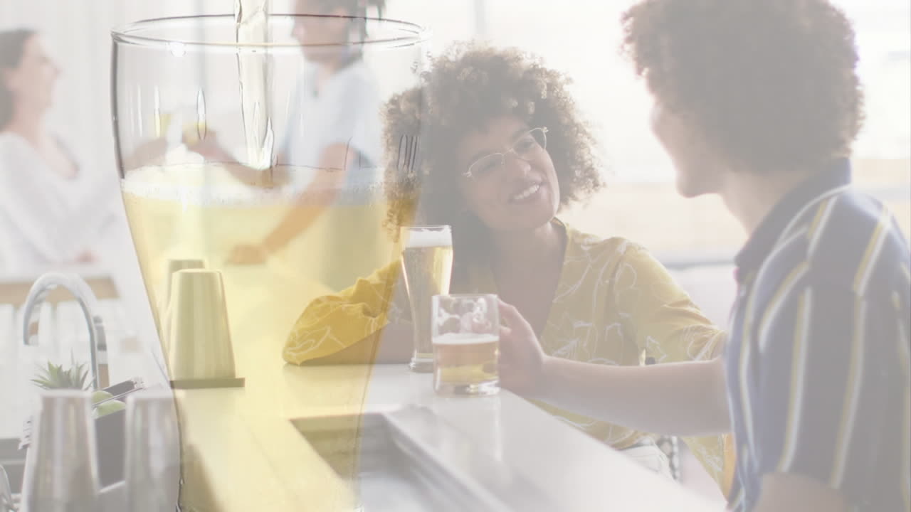 Animation of glass with beer over diverse friends having drink in bar