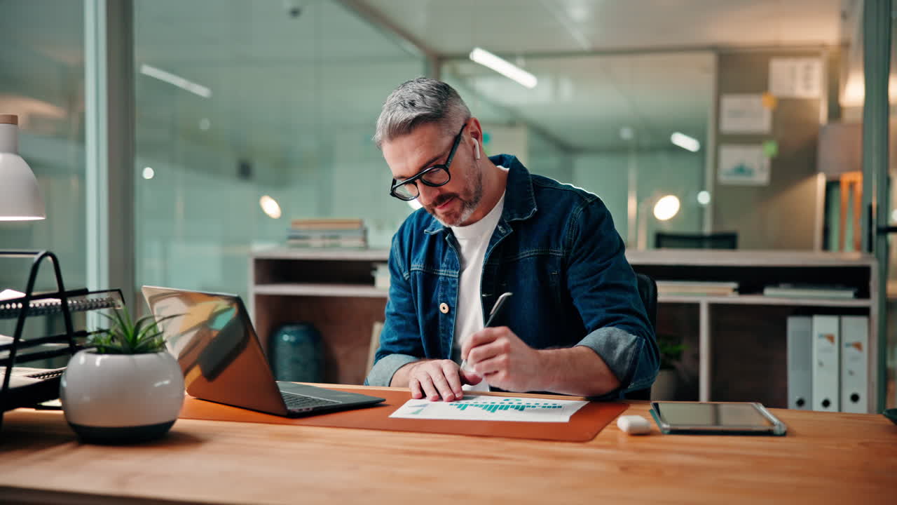 Man working at his desk in a modern office